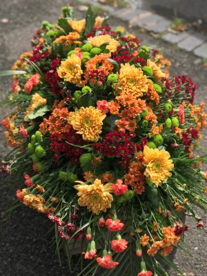 Autumnal casket spray