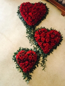 Triple red rose heart